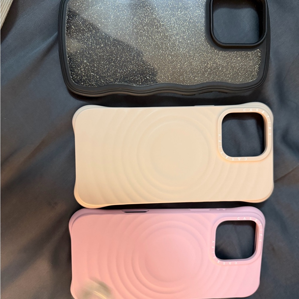 Casetify Black, Cream, and Pink Phone Cases